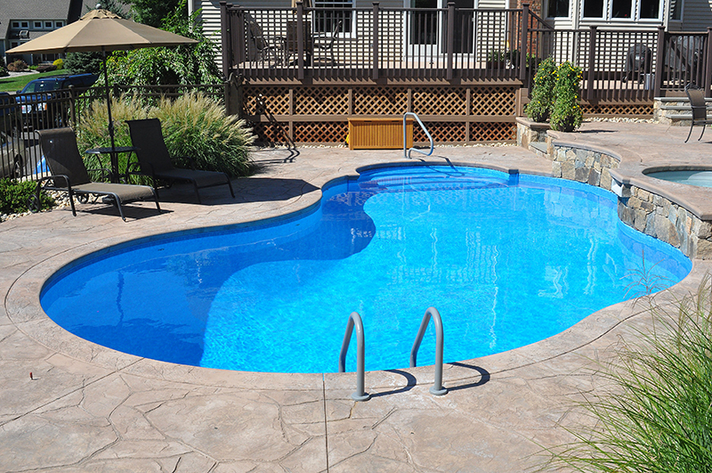 Swimming pool and stamped concrete project example 120